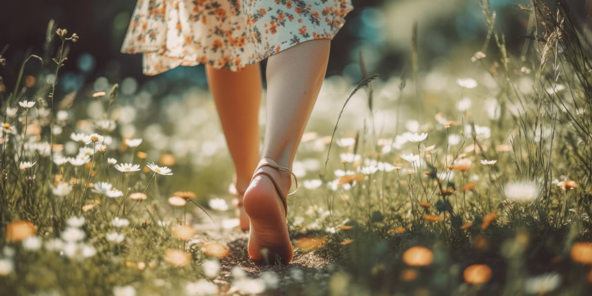 woman walking barefoot in nature